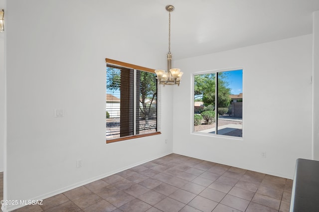 2145 N Horseshoe Trl, Tucson, AZ 85745 - spare room with a chandelier