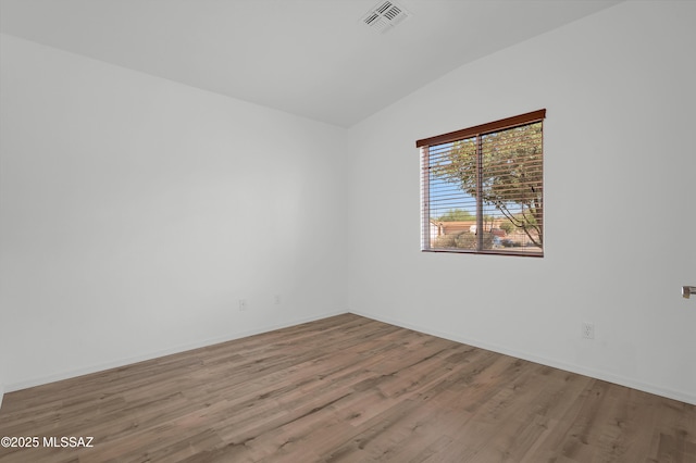 2145 N Horseshoe Trl, Tucson, AZ 85745 - spare room with wood finished floors and baseboards