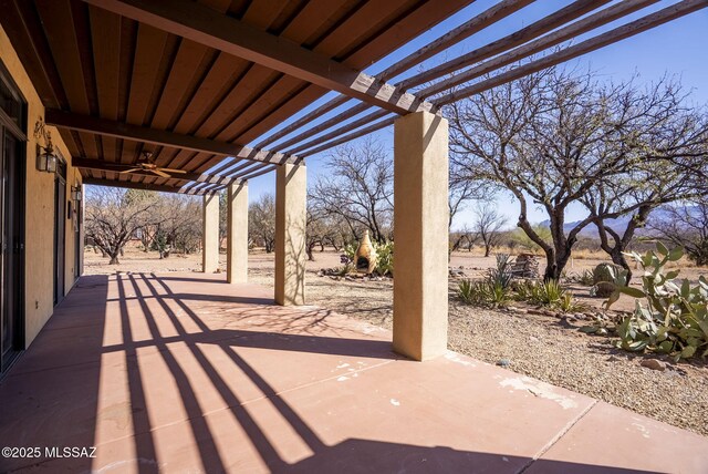 view of patio with a pergola and a ceiling fan