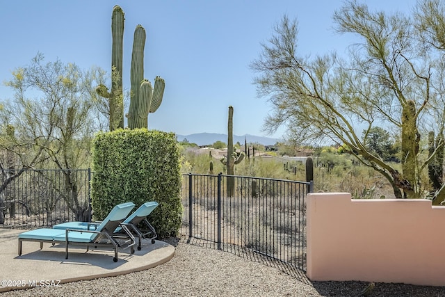 5140 N Via Condesa, Tucson, AZ 85718 - gate featuring a mountain view and a patio area