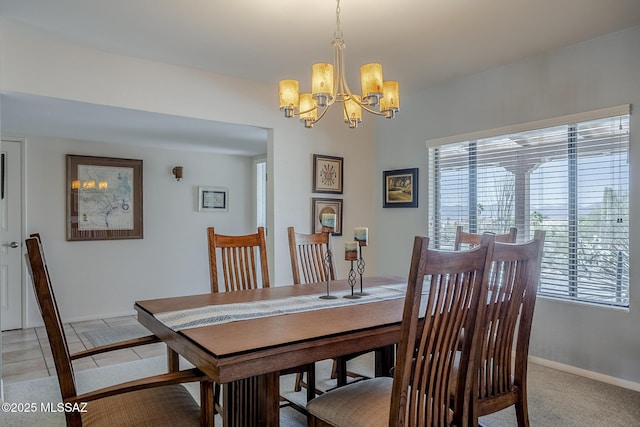 5140 N Via Condesa, Tucson, AZ 85718 - dining space featuring a chandelier, healthy amount of natural light, and baseboards
