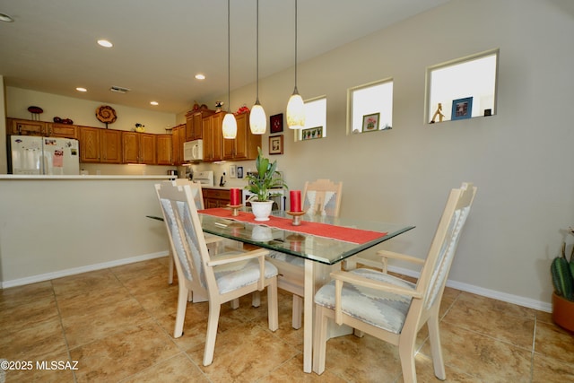 dining space with visible vents, recessed lighting, and light tile patterned floors