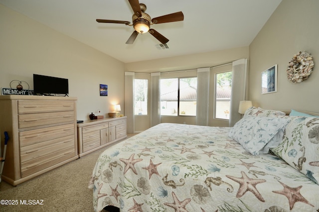 bedroom featuring light carpet, a ceiling fan, visible vents, and vaulted ceiling
