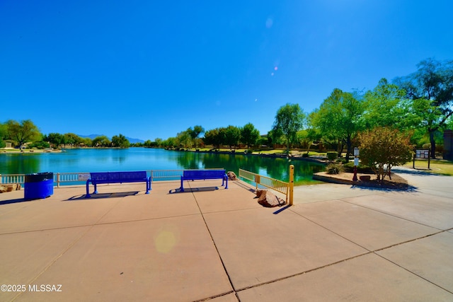 view of home's community with a water view