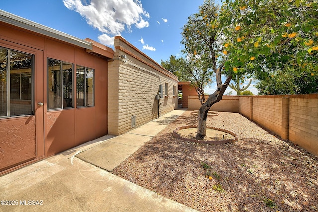 view of yard with a patio and a fenced backyard