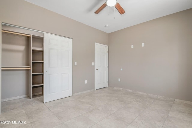 358 W Elvira Rd, Tucson, AZ 85756 - unfurnished bedroom featuring a closet and a ceiling fan