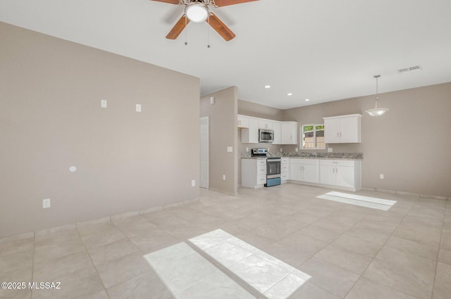 358 W Elvira Rd, Tucson, AZ 85756 - kitchen featuring ceiling fan, light tile patterned floors, white cabinetry, visible vents, and appliances with stainless steel finishes