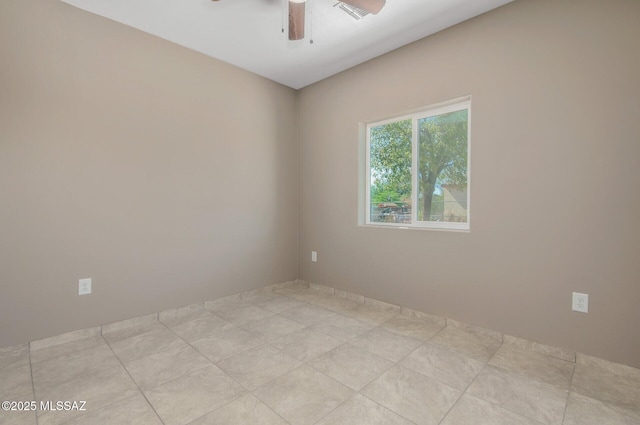 358 W Elvira Rd, Tucson, AZ 85756 - spare room featuring a ceiling fan and visible vents