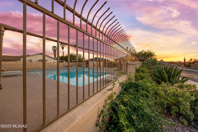 10101 E Bryonwood Ln, Tucson, AZ 85730 - view of pool with a fenced in pool, a fenced backyard, and a patio area