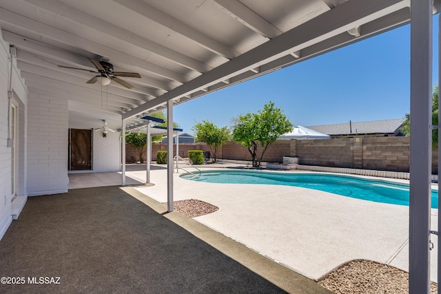 view of pool featuring a fenced in pool, a ceiling fan, a patio, and a fenced backyard