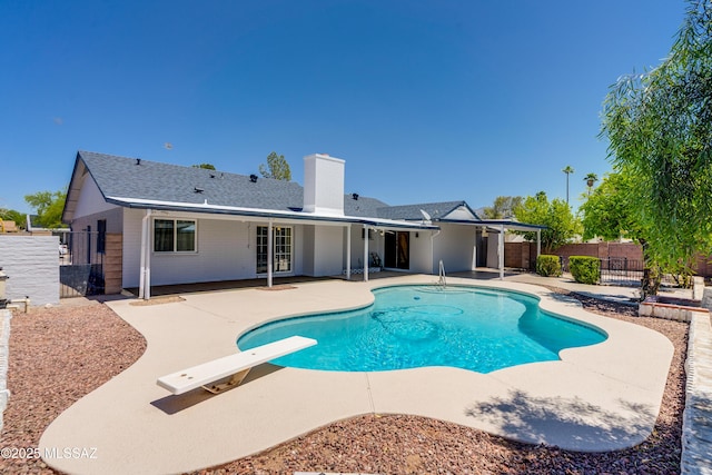 view of pool with fence, a patio area, and a fenced in pool