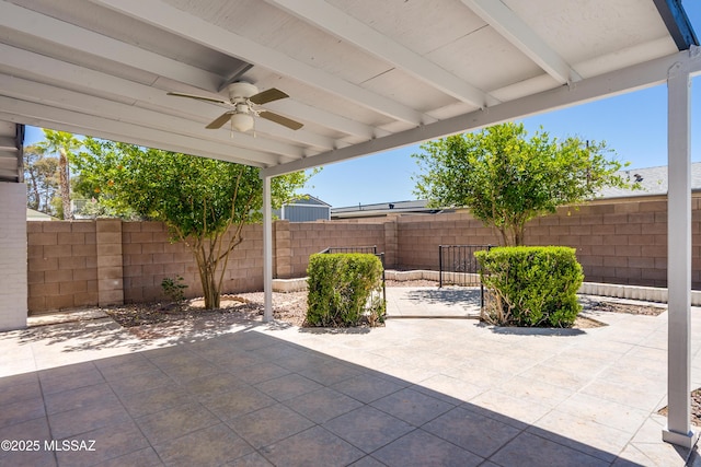 view of patio / terrace with a ceiling fan and a fenced backyard