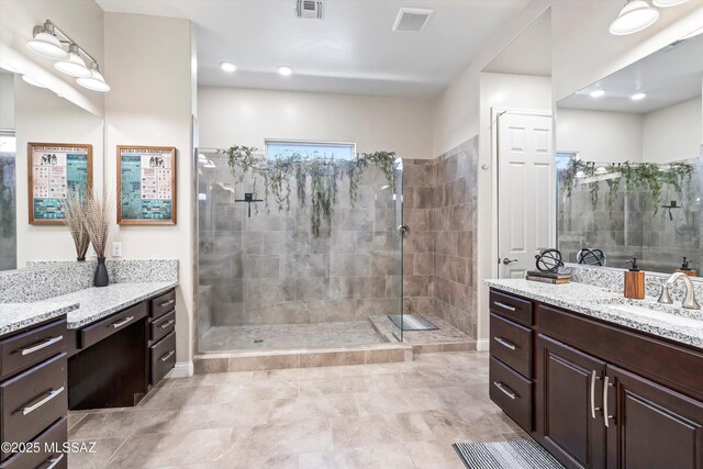 660 W Aviator Crossing Dr, Oro Valley, AZ 85755 - full bath featuring visible vents, vanity, and tiled shower