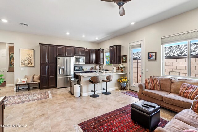 660 W Aviator Crossing Dr, Oro Valley, AZ 85755 - living area with ceiling fan, recessed lighting, light tile patterned flooring, and visible vents