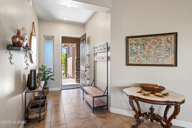 660 W Aviator Crossing Dr, Oro Valley, AZ 85755 - foyer entrance with baseboards and tile patterned flooring
