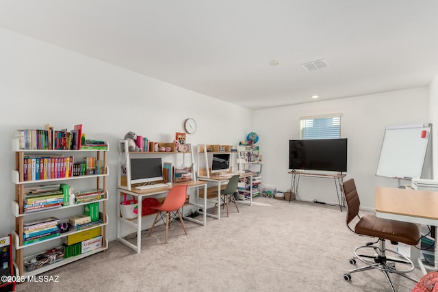 office space featuring carpet floors and visible vents