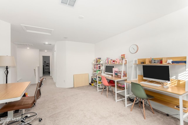 carpeted office with attic access and visible vents