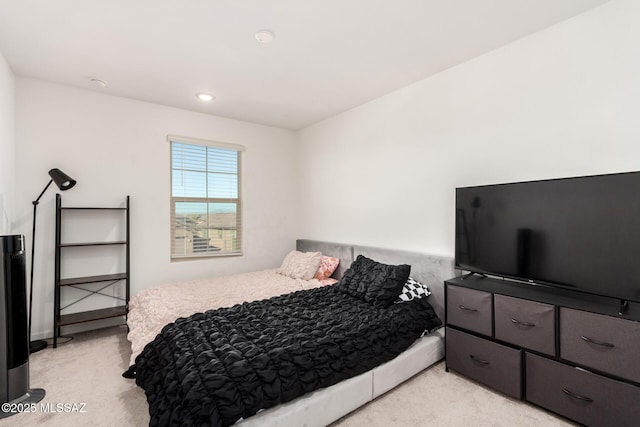 bedroom with recessed lighting and light colored carpet