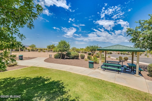 view of community with a gazebo and a yard
