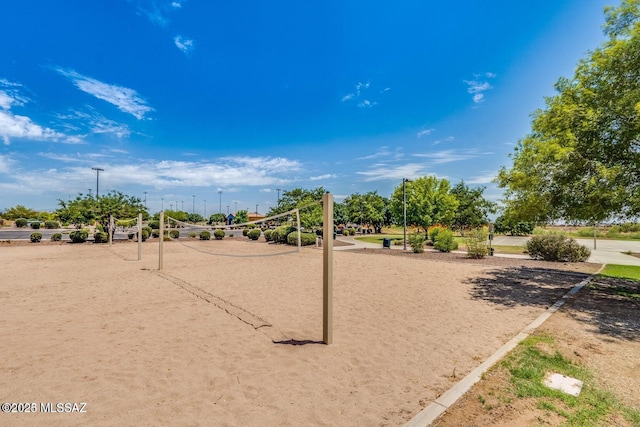 view of home's community featuring volleyball court