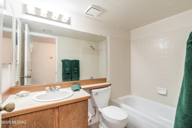 full bathroom with visible vents, toilet, tub / shower combination, and vanity