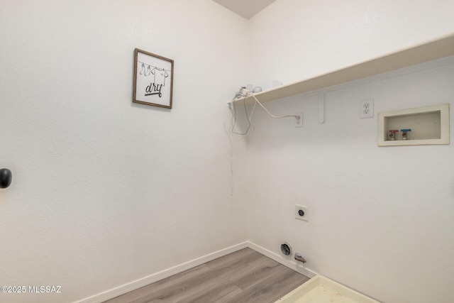 laundry room with wood finished floors, electric dryer hookup, laundry area, hookup for a washing machine, and hookup for a gas dryer