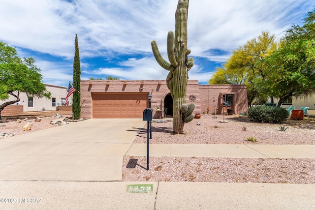 view of front of property with an attached garage and driveway