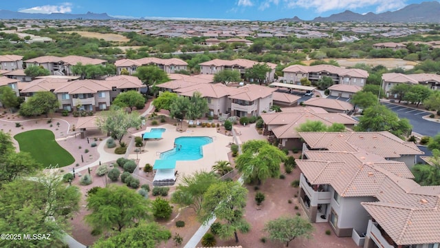 drone / aerial view featuring a mountain view and a residential view