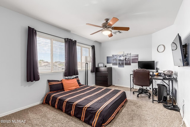 bedroom featuring carpet flooring, a ceiling fan, visible vents, and baseboards