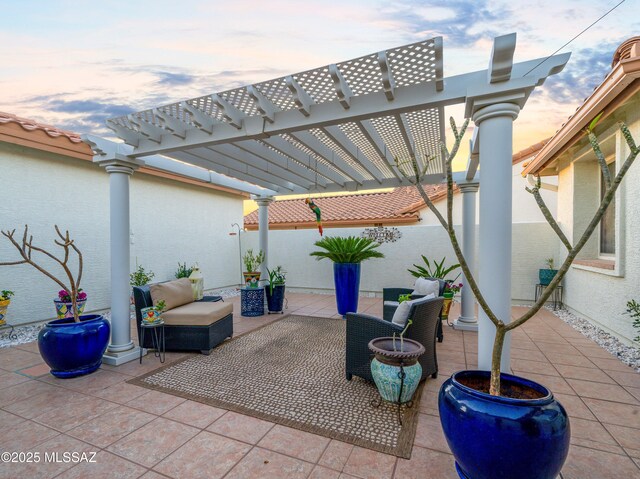 view of patio / terrace with fence, an outdoor hangout area, and a pergola