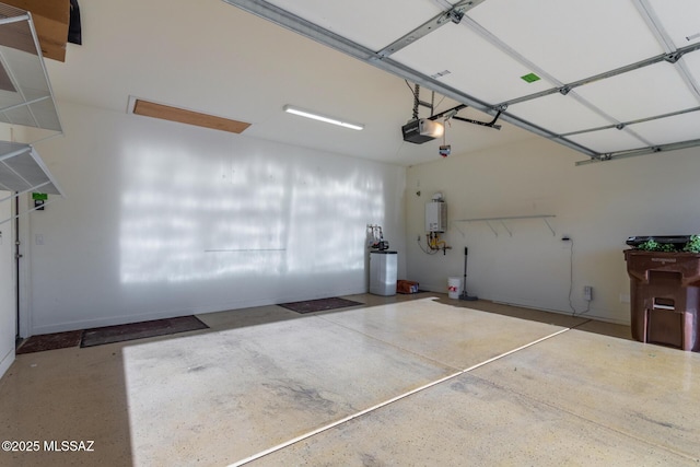 garage with tankless water heater and a garage door opener