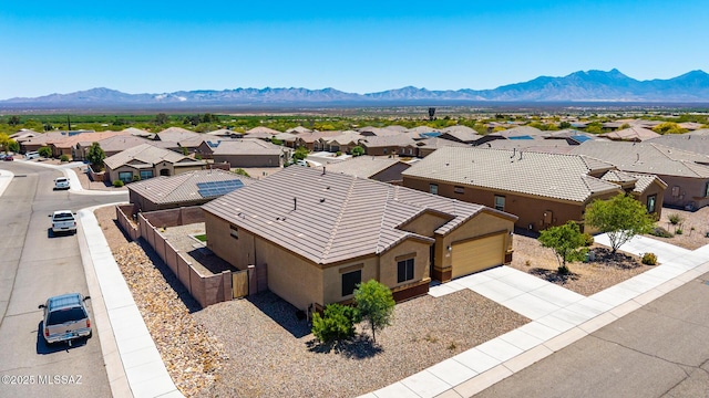 birds eye view of property featuring a residential view and a mountain view