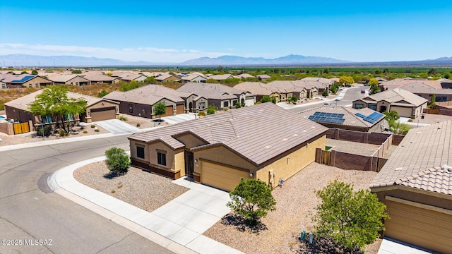 bird's eye view featuring a mountain view and a residential view