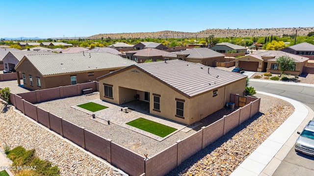 birds eye view of property featuring a residential view and a mountain view