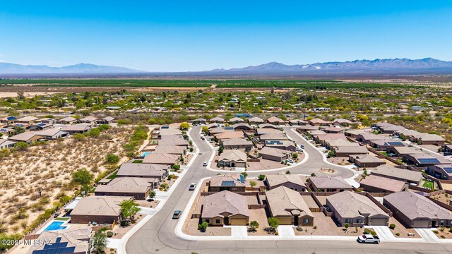 aerial view featuring a mountain view and a residential view