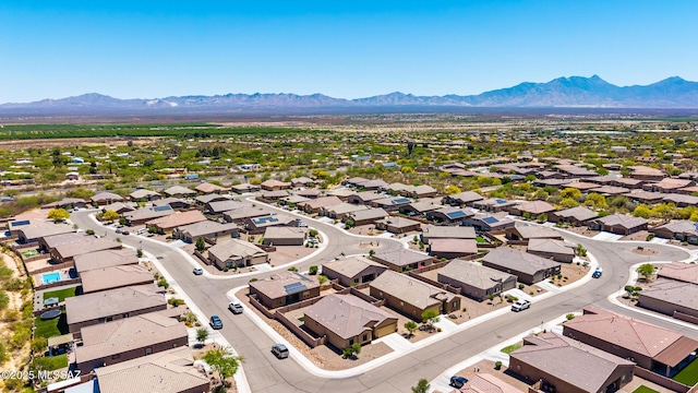 bird's eye view with a residential view and a mountain view