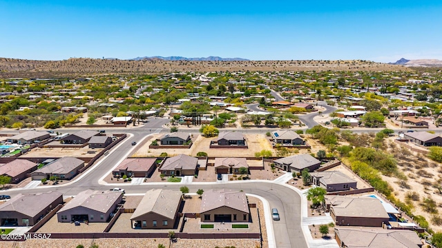 birds eye view of property with a residential view and a mountain view
