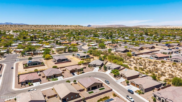 aerial view featuring a mountain view and a residential view