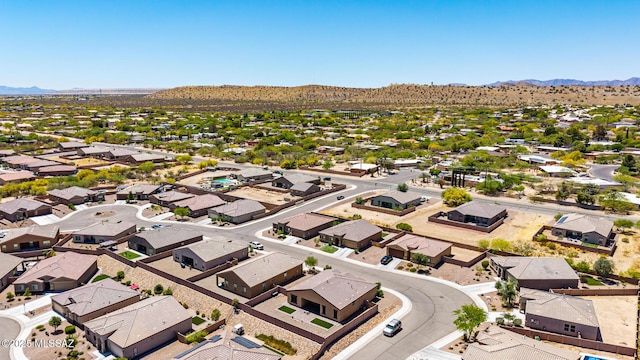 birds eye view of property with a residential view and a mountain view