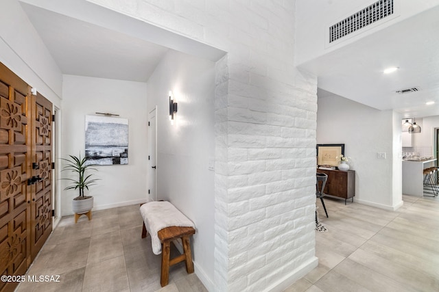 3855 N Via Avellana, Tucson, AZ 85718 - foyer featuring light tile patterned floors and baseboards