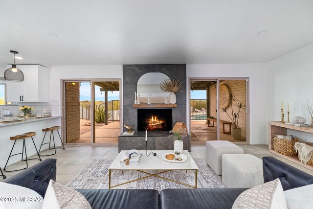 3855 N Via Avellana, Tucson, AZ 85718 - living room with plenty of natural light and a fireplace