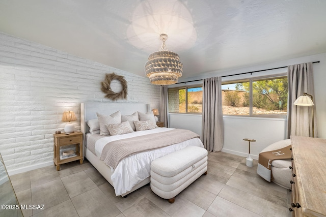 3855 N Via Avellana, Tucson, AZ 85718 - bedroom with a chandelier, baseboards, and light tile patterned flooring