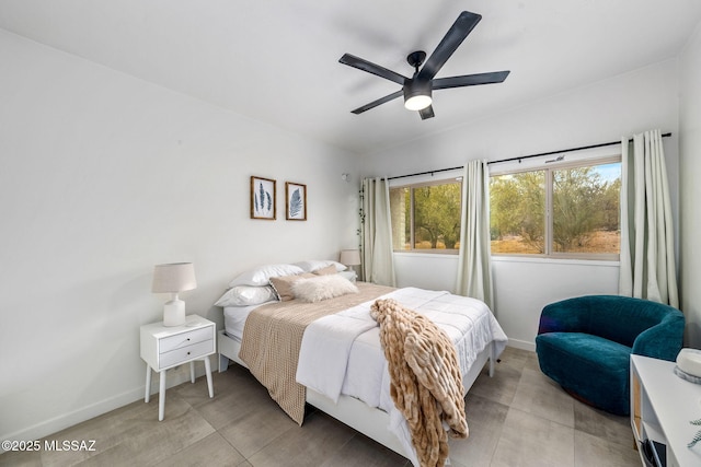 3855 N Via Avellana, Tucson, AZ 85718 - bedroom featuring baseboards and ceiling fan
