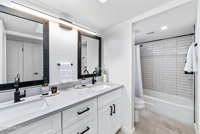 3855 N Via Avellana, Tucson, AZ 85718 - bathroom with double vanity, toilet, and shower / bathtub combination with curtain