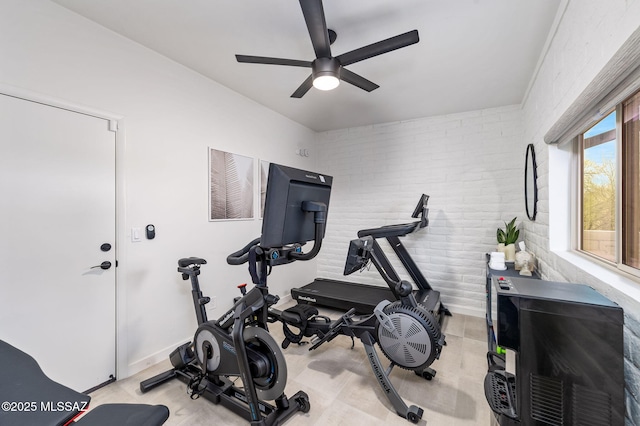 3855 N Via Avellana, Tucson, AZ 85718 - workout room with a ceiling fan and brick wall