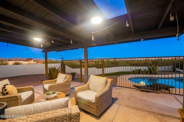 3855 N Via Avellana, Tucson, AZ 85718 - fenced backyard featuring a patio area and an outdoor living space