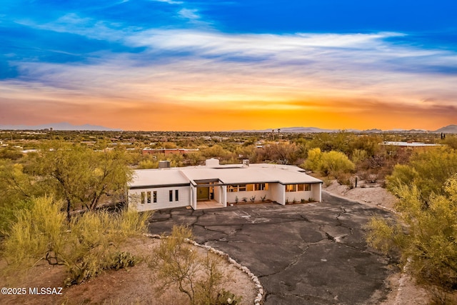 3855 N Via Avellana, Tucson, AZ 85718 - view of front of home with a mountain view and a chimney