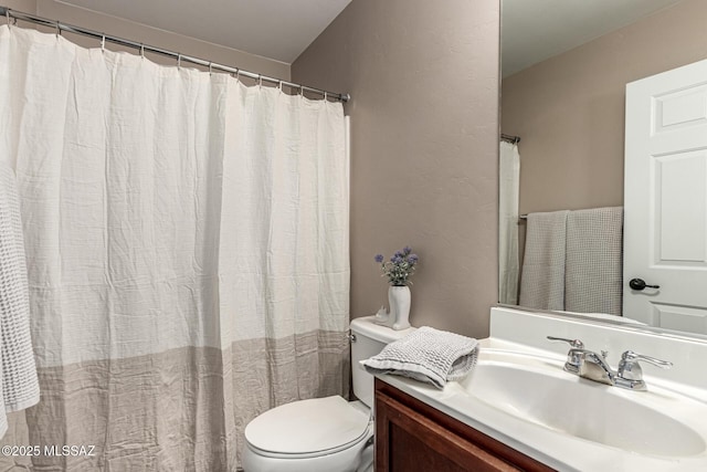 9528 S Desert Fauna Loop, Tucson, AZ 85747 - bathroom featuring toilet and vanity