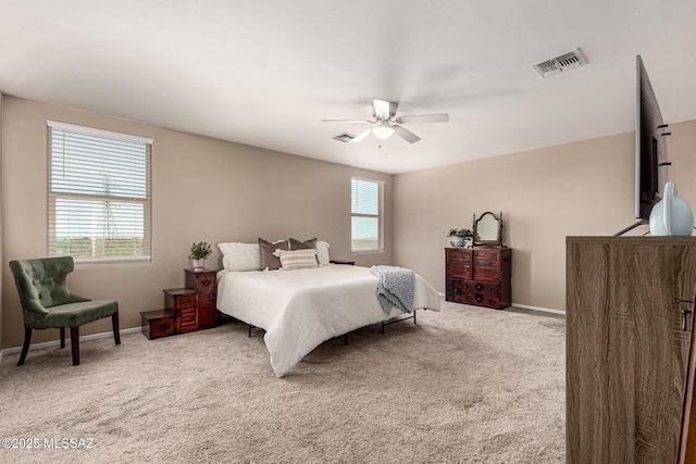 9528 S Desert Fauna Loop, Tucson, AZ 85747 - carpeted bedroom with visible vents, baseboards, and ceiling fan