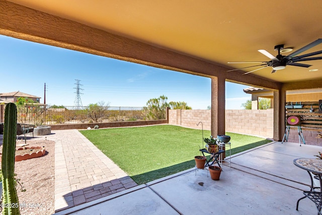 9528 S Desert Fauna Loop, Tucson, AZ 85747 - view of patio featuring a fenced backyard and ceiling fan